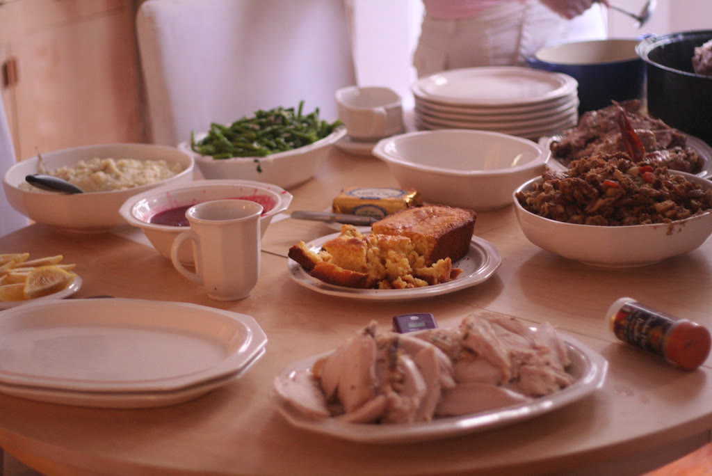 A Southern buffet spread of fried chicken, fresh vegetables, and cornbread at The Heritage House